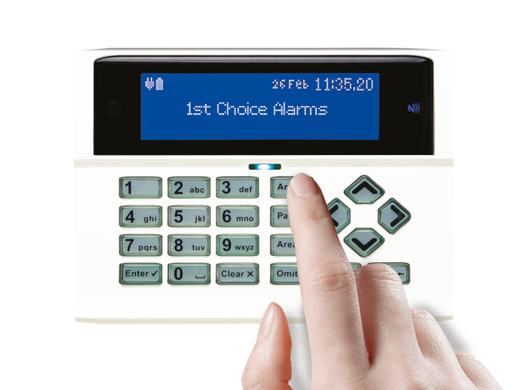 Engineer operating alarm keypad